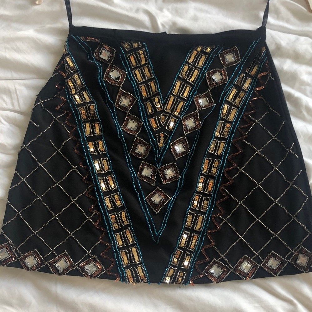 Black bedazzled mini skirt